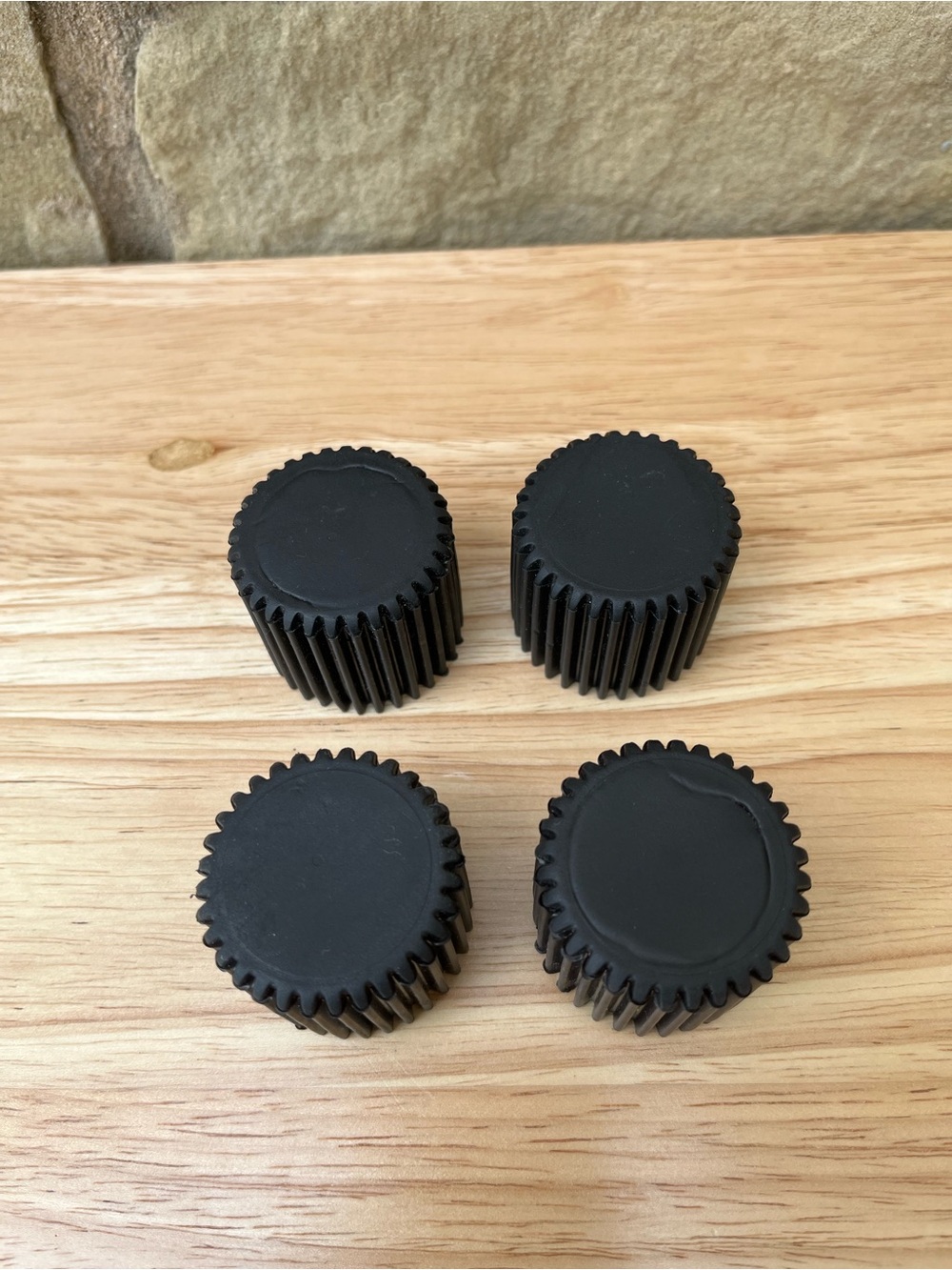 Set of 4 Black Ribbed Plastic Ironing Board Leg Caps